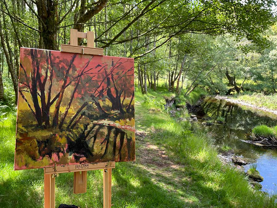 Painting in progress on the easel on location at the river in Glencree 