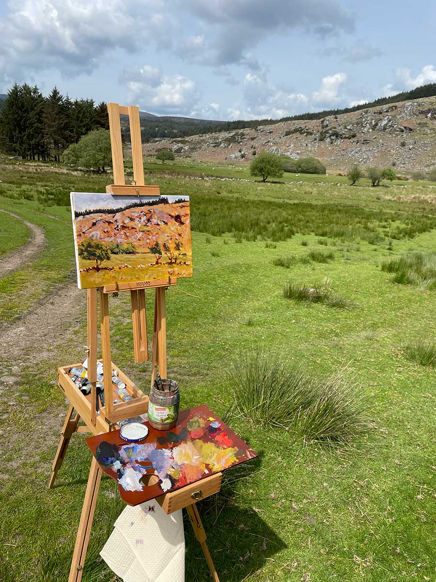 Painting in progress on easel on location  in Lough Dan