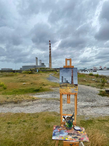 Painting in progress on an easel on location in Poolbeg Dublin.